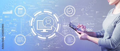 Fotomural Document management system concept with business woman using a tablet computer
