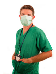 attractive and successful medicine doctor or nurse man posing confident for hospital staff corporate portrait  in green medical uniform and face mask isolated on white