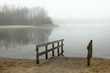 © FotoGui - Foggy, wintery images of a lake: the Plas in Rotselaar in Flanders, Belgium. On the image a slope for disabled .