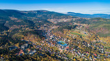 Fototapeta Krajobraz - Aerial view of Karpacz city at the foot of Sniezka and the Karkonosze National Park