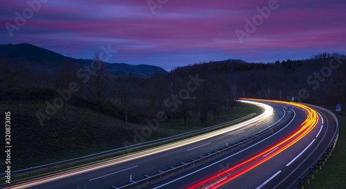 Car lights on the highway at night, Gipuzkoa Poster Mural XXL