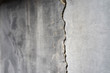 © cherokee4 - Old foundation and plaster wall with cracks. Building requiring repair closeup.