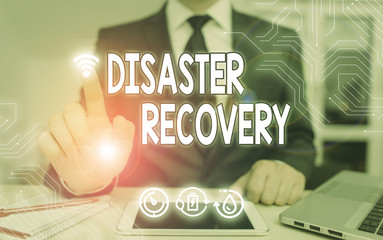 Wall Mural - handwriting text disaster recovery. conceptual photo helping showing affected by a serious damaging 