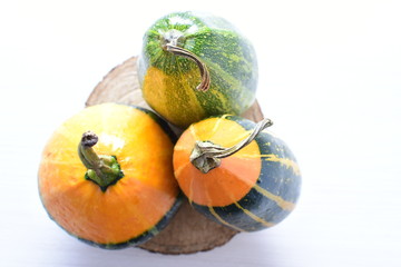 Whole green and yellow natural squash