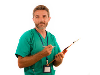 isolated portrait of young attractive and happy medicine doctor or nurse man holding clipboard medical paperwork on white background in health care hospital attendant concept