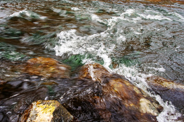 water flowing over rocks