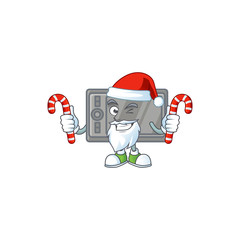 Sticker - cartoon mascot style of wacom in Santa costume with candy