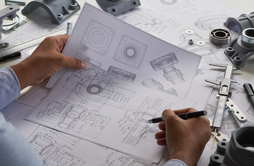 Poster - Engineer technician designing drawings mechanical parts engineering Engine.manufacturing factory Industry Industrial work project blueprints measuring bearings caliper tools