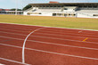 © piyaphong - White lines of stadium and texture of running racetrack red rubber racetracks
