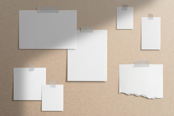 Wall Mural - Moodboard template composition with blank photo cards, torn paper, square frame glued with adhesive tape on coffee color background as template for graphic designers presentations, portfolios etc.