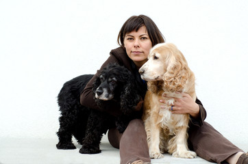 Woman Hugging Her Cute Dogs.