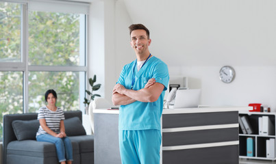 Poster - Portrait of male receptionist in clinic