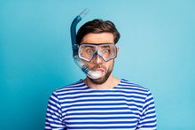Photo Of Funky Emotional Handsome Guy Tourist Diving Underwater Mask See Colorful Fish Corals Breathing Tube Floating Deep Wear Striped Sailor Shirt Isolated Blue Color Background