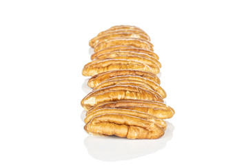 Wall Mural - Lot of whole tasty brown pecan half in row isolated on white background