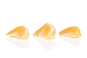 Canvas Print - Group of three pieces of peeled fresh orange mandarin isolated on white background