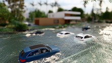 Cars Driving On A Flooded Road During A Flood Caused By Heavy Rain 3d Rendering