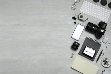 Wall Mural - flat lay composition with equipment for journalist on light table. space for text