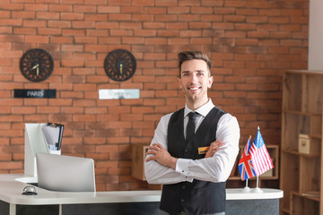 Sticker - Portrait of male receptionist in hotel