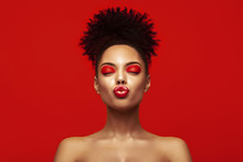 Kiss Lips. Share Love.Valentine Day. African Makeup Face. Satisfied Brunette Young Woman With Afro Hair Style Against Colorful Background.