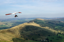 Two Men Hang Gliding Together Over The Hope Valley In Peak District National Park Derbyshire England United Kingdom UK