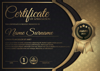 premium golden black certificate template design.	