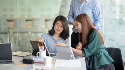 Canvas Print - close up view of application developer team brainstorming on their project in co working space