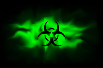 biohazard sign on a background of infected green fog. spreading smoke attack biological weapons. dan