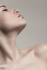 natural beauty concept young woman profile face and neck studio shot