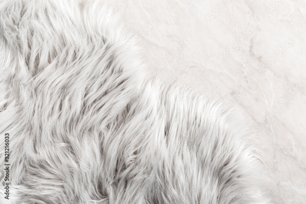 White fur for background or texture. Fuzzy white fur plaid. Shaggy blanket background. Fluffy fake textile fur. Flat lay, top view, copy space - obrazy, fototapety, plakaty 