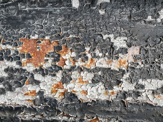 Wall Mural - Texture old black cracked paint on rusty metal plate