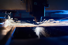 CNC Laser Cutting Of Metal Close Up, Modern Industrial Technology. Small Depth Of Field