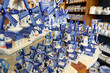 © Massimo Parisi - Delft, the netherlands, august 2019. At a shop of the famous white and blue ceramics of miniature windmills to buy as a souvenir.