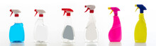 Cleaning Spray Bottles Set Isolated Against White Background.