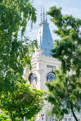 Wall Mural - The Palace of Culture in Iasi, Romania. Front view from the Palace Square of The Palace of Culture, the symbol of the city of Iasi on a sunny summer day. Palace of Iasi