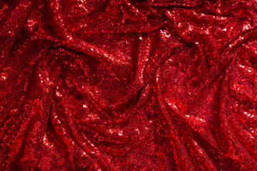 bright red shiny patchwork fabric lined with skladak as a background