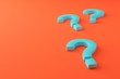 © Jamo Images - 3 blue question marks on orange floor. Concept of customer support. 3D rendering with copy space.