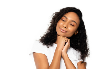 Wall Mural - happy african american woman with closed eyes isolated on white