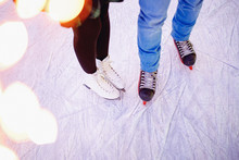Ice Skating Lover Couple Having Fun On Snow Winter Holidays Night Illumination