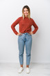© Asier - Full body young caucasian woman confident keeping hands on hips.