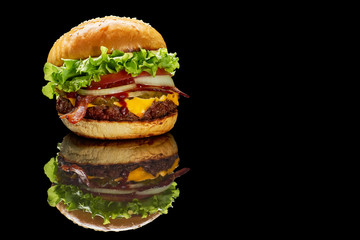 Wall Mural - Hamburger with reflection on black background