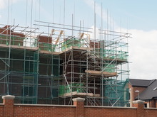 Some New Flats, Apartments Being Built Showing Brickwork And Scaffolding