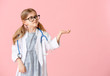 © Pixel-Shot - Cute little doctor on color background