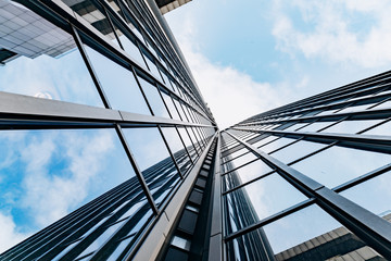 Blue skyscraper facade. office buildings. modern glass silhouettes