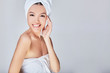 © Svitlana - Pretty girl with perfect smile in bath towel looking to the camera.