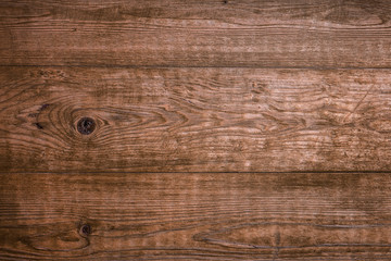 Wall Mural - Brown vintage old wooden planks with knots, scratches and cracks. Abstract modern trendy wood texture background