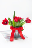 Fototapeta Tulipany - Bouquet of tulips in an iron bucket