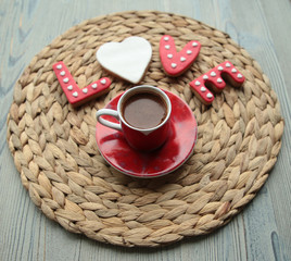 Wall Mural - a cup of Turkish coffee and cookies specially prepared for Valentine's Day.