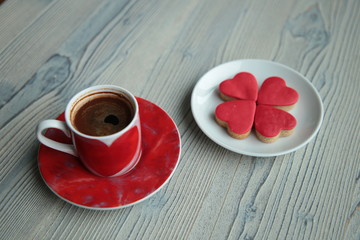 Wall Mural - a cup of Turkish coffee and cookies specially prepared for Valentine's Day.