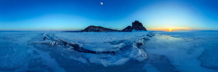 Wall Mural - Big cracks in the ice of Lake Baikal at the Shaman Rock on Olkhon Island. Cylindrical panorama 360