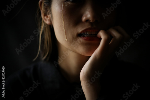 涙を流しながら爪を噛む女性 Buy This Stock Photo And Explore Similar Images At Adobe Stock Adobe Stock